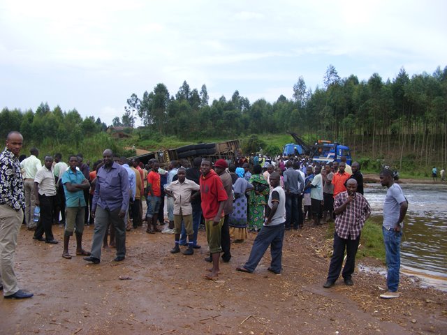 Overturned lorry. bus from Kampala to Kigali