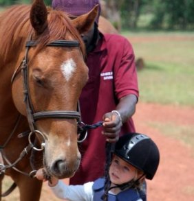 Child and horse - Nile Horseback Safaris Jinja Uganda