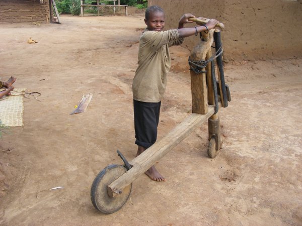 Kihihi bike or chukudu. Deo's model homestead, Ishasha Kihihi bike or chukudu. Deo's model homestead, Ishasha