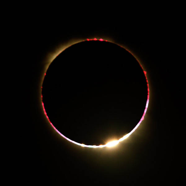Diamond ring and chromosphere. A close-up of Uganda's total solar eclipse 2013. Photo courtesy of John McDonald. Diamond ring and chromosphere. A close-up of Uganda's total solar eclipse 2013. Photo courtesy of John McDonald.