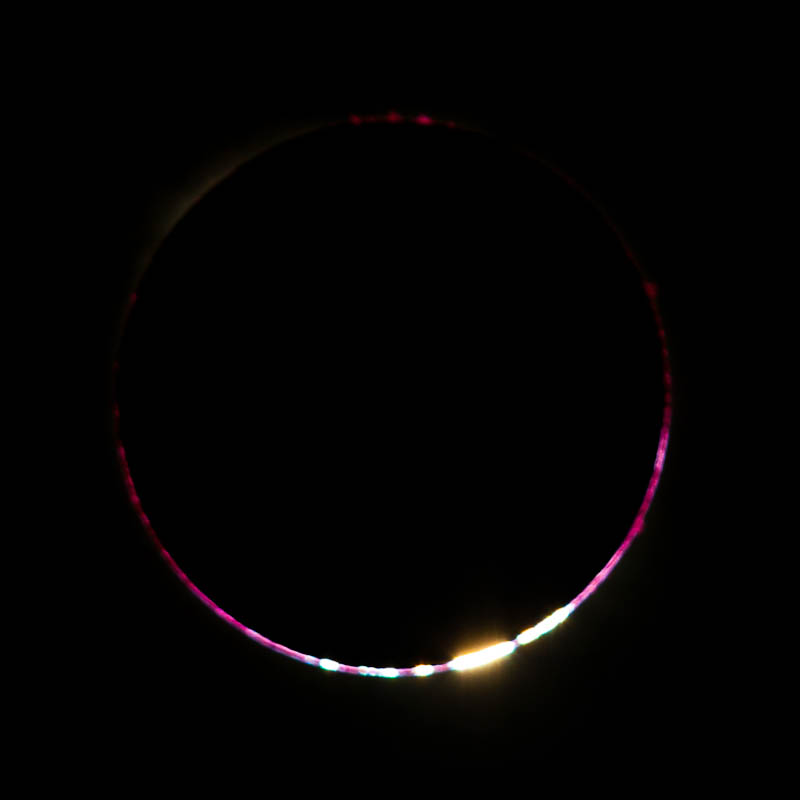 Diamond ring and chromosphere. A close-up of Uganda's total solar eclipse 2013. Photo courtesy of John McDonald. Diamond ring and chromosphere