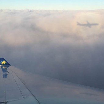 RwandAir flight aerial view wing. Diary of a Muzungu blog