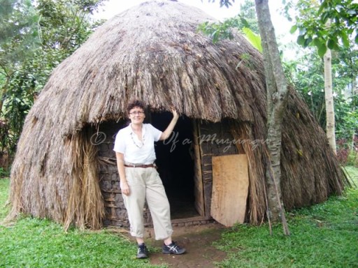A very frumpy-looking Muzungu checking out the traditional accommodation option A very frumpy-looking Muzungu checking out the traditional accommodation option