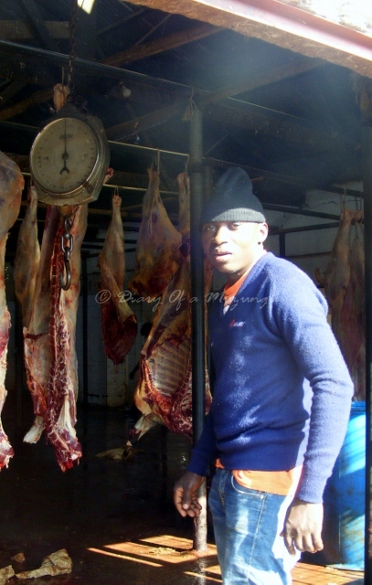 My idea of hell - but just another day at work for this guy worker Kalerwe abattoir
